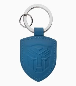 Porsche Design Crest Key Ring – Transformers: Rise Of The Beasts X Porsche Color Blau -Porsche Design Store wap0503670rtrf 002 ga pd sall ain v1